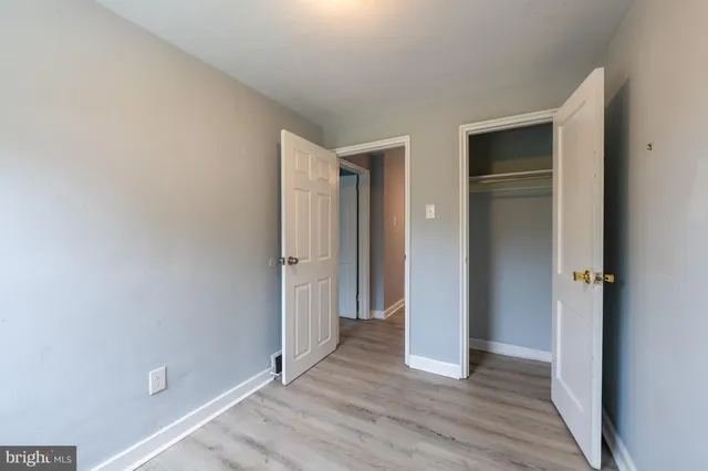 a view of wooden floor in an empty room