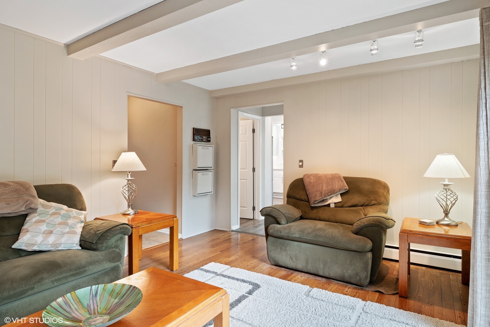 1715 Sequoia Trail Glenview, IL 60025 - Photo 12 of 29 a living room with furniture and a lamp