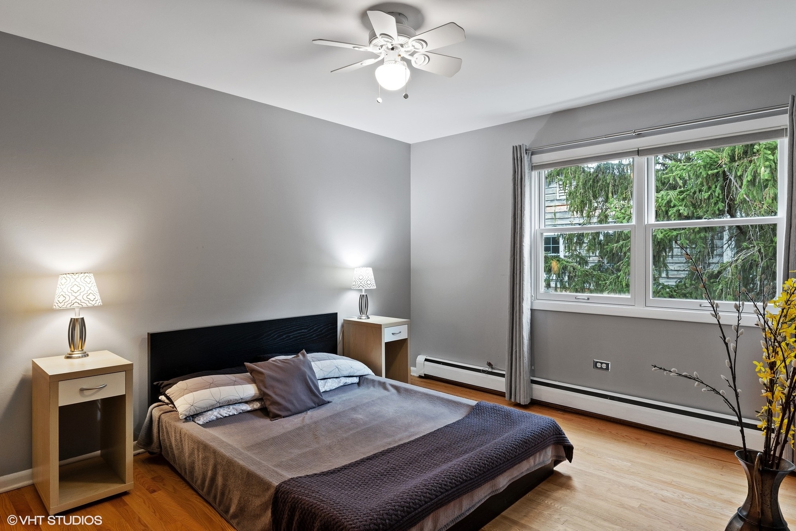 1715 Sequoia Trail Glenview, IL 60025 - Photo 18 of 29 a bedroom with a bed and a chandelier