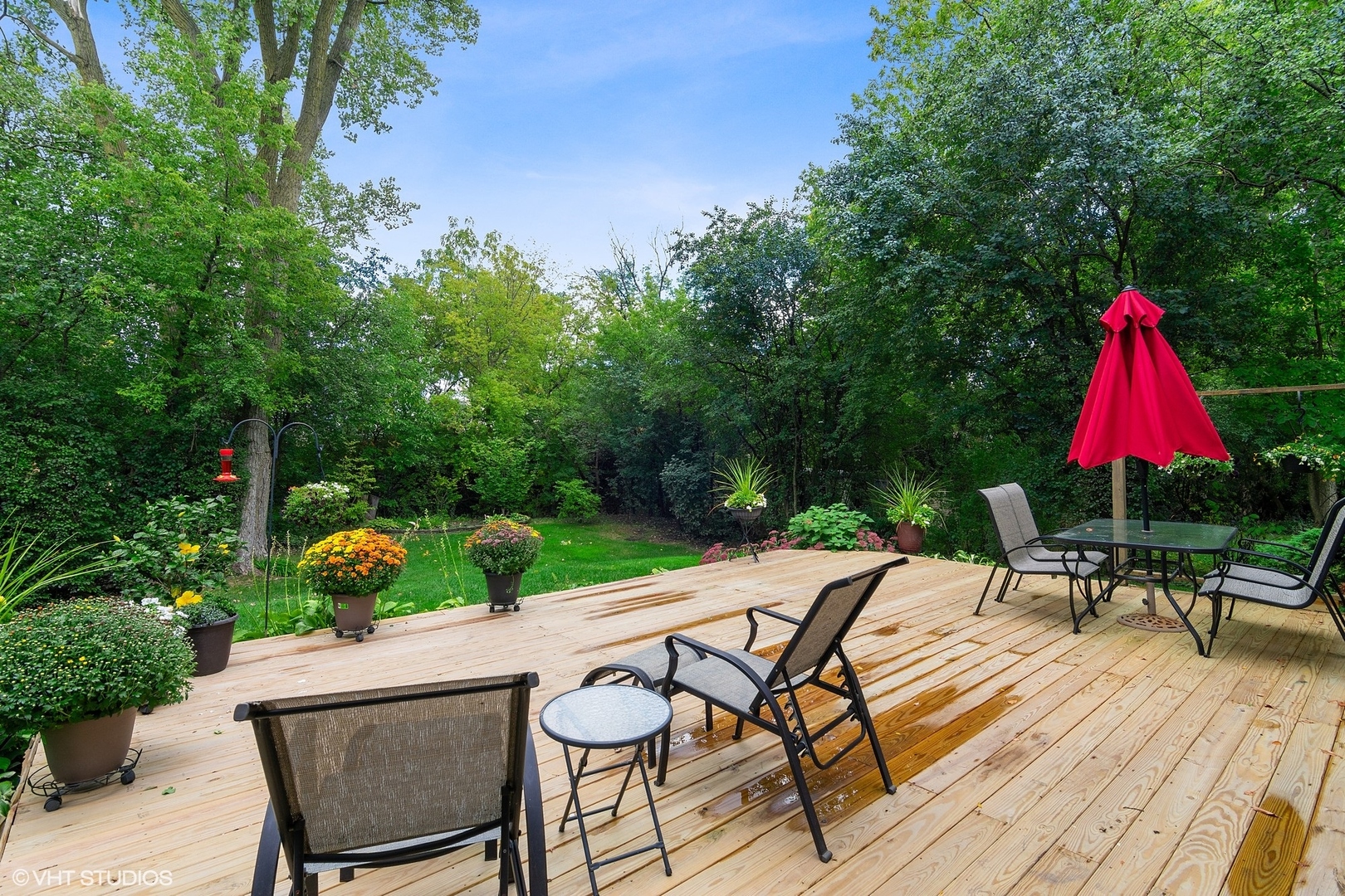 1715 Sequoia Trail Glenview, IL 60025 - Photo 23 of 29 a view of backyard with sitting area and garden