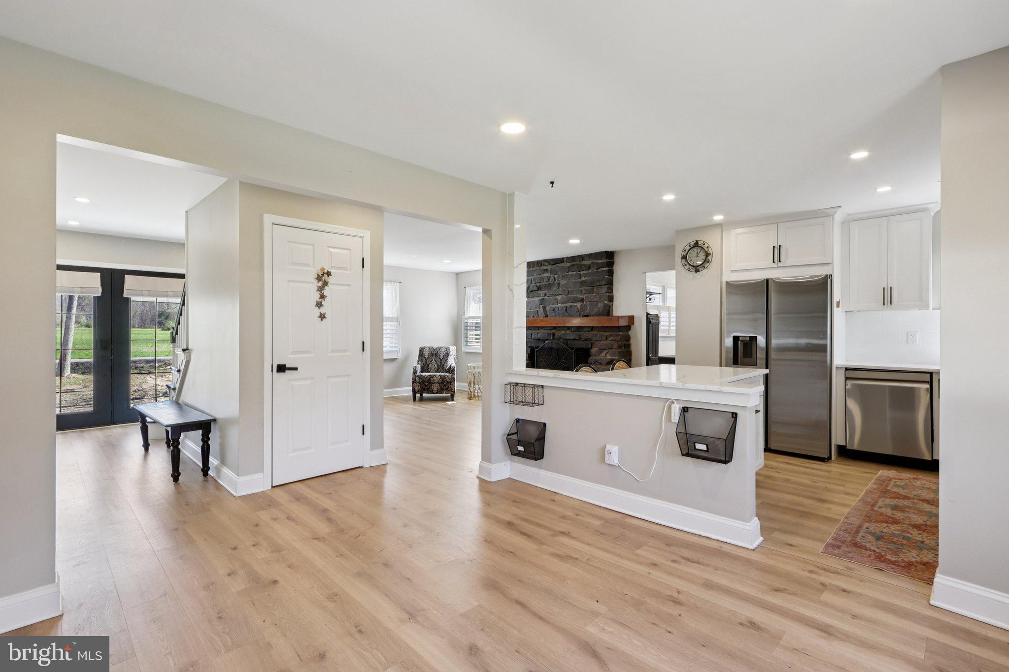 351 Merrick Road Robbinsville, NJ 08691 - Photo 20 of 69 a view of kitchen with stainless steel appliances refrigerator stove microwave and cabinets