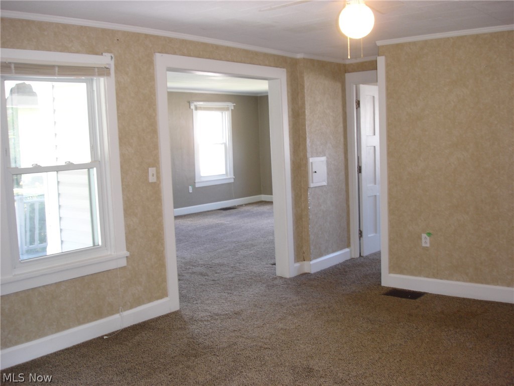 77 South Maple State Road Orwell, OH 44076 - Photo 6 of 30 View from dining room into living room.