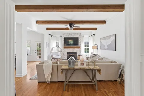 a kitchen with kitchen island cabinets and refrigerator