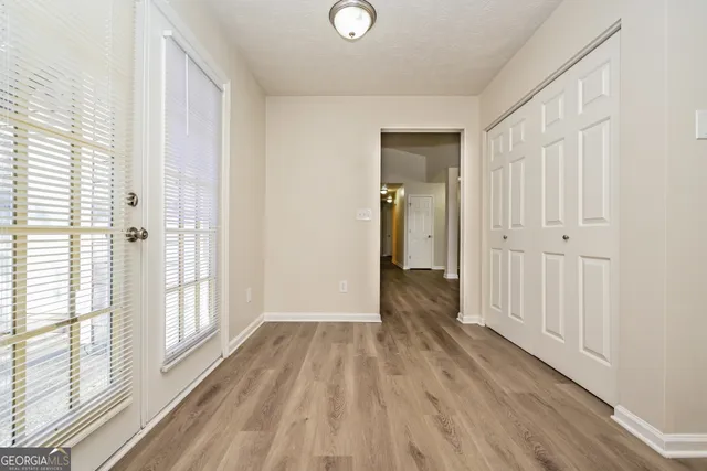 a view of a livingroom with wooden floor