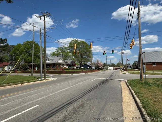 a view of a street with houses