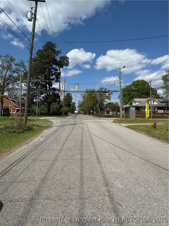 203 Harris Avenue Raeford, NC 28376 - Photo 5 of 5 a view of a building with a yard