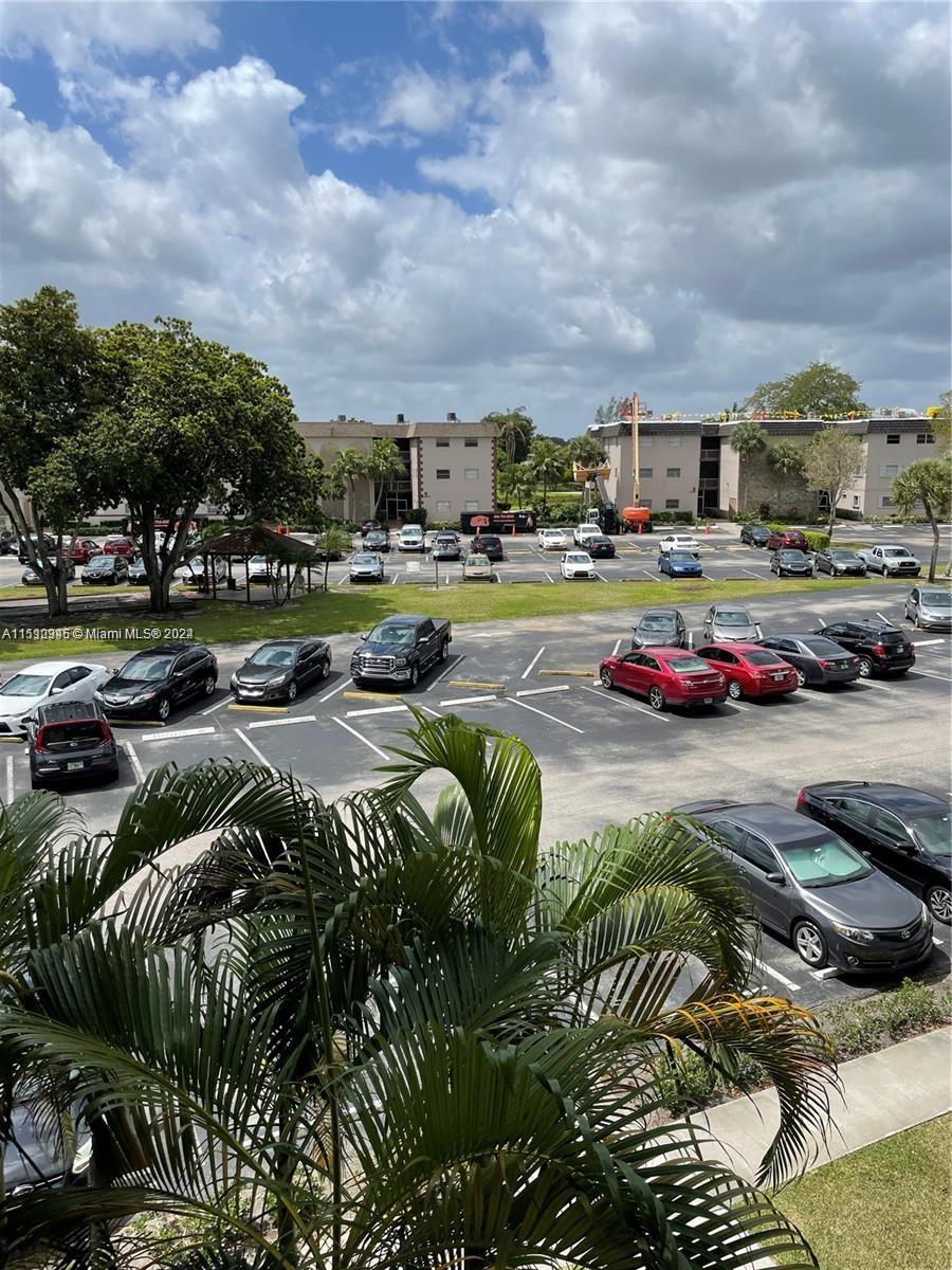 Arrowhead Davie, FL 33324 - Photo 26 of 40 a cars parked in front of a building