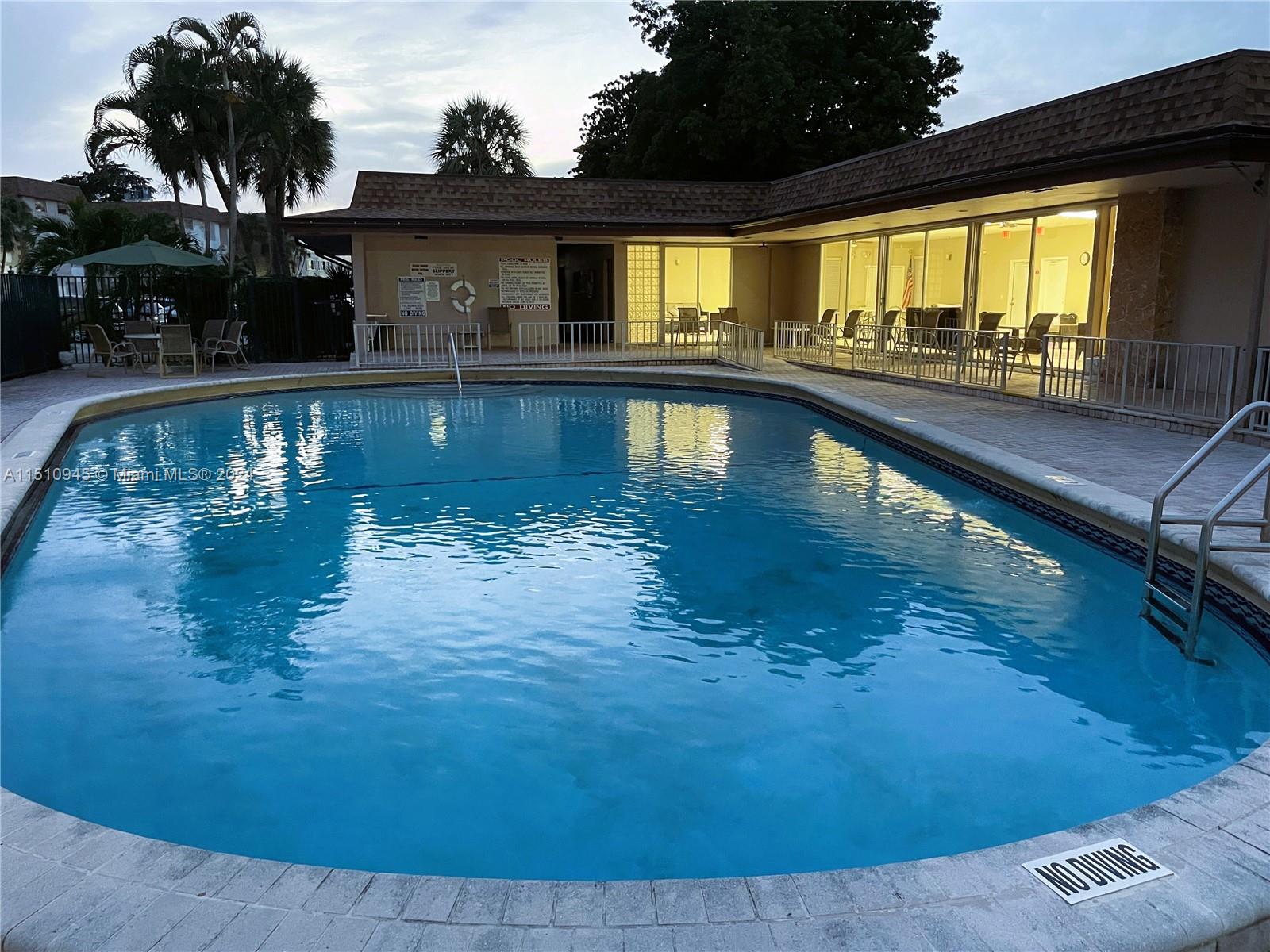 Arrowhead Davie, FL 33324 - Photo 33 of 40 a swimming pool view with a outdoor seating