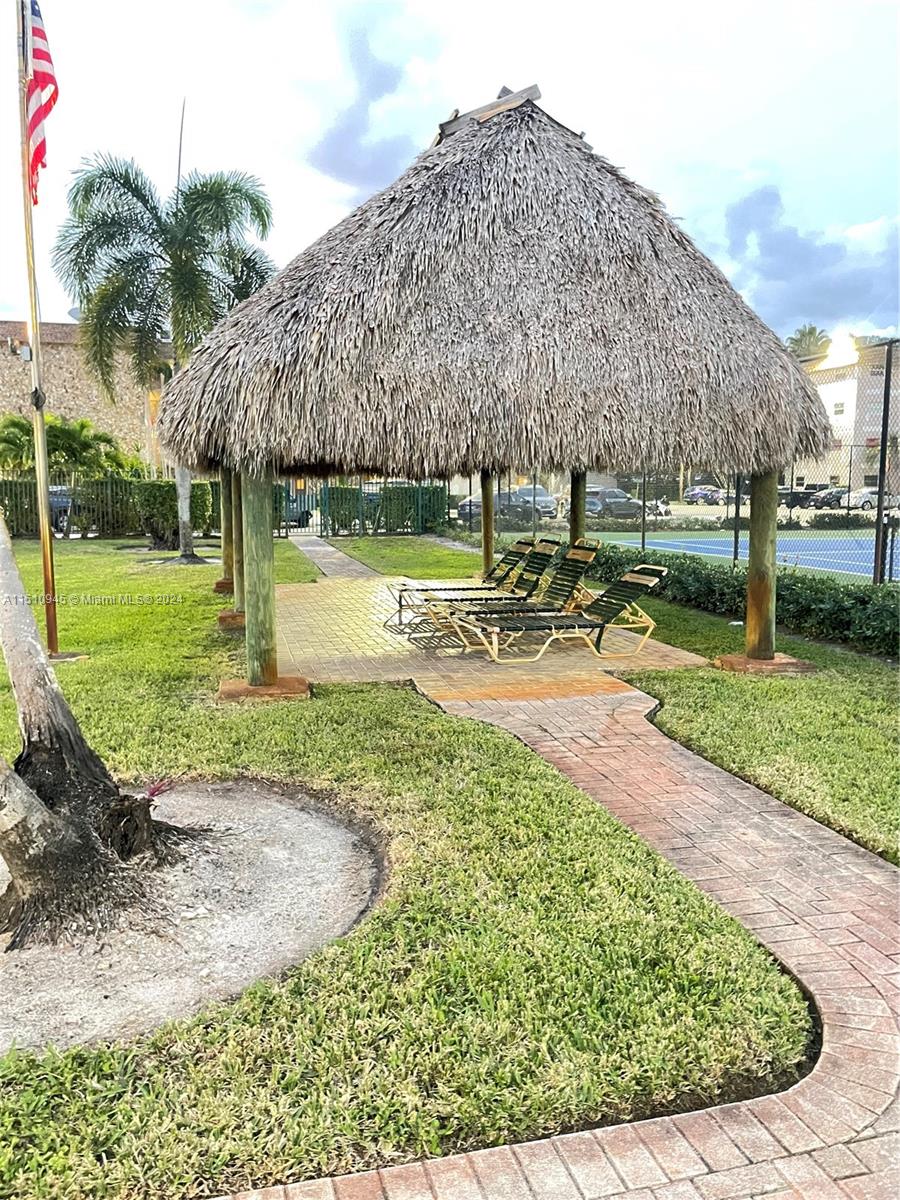 Arrowhead Davie, FL 33324 - Photo 36 of 40 a view of a house with a yard