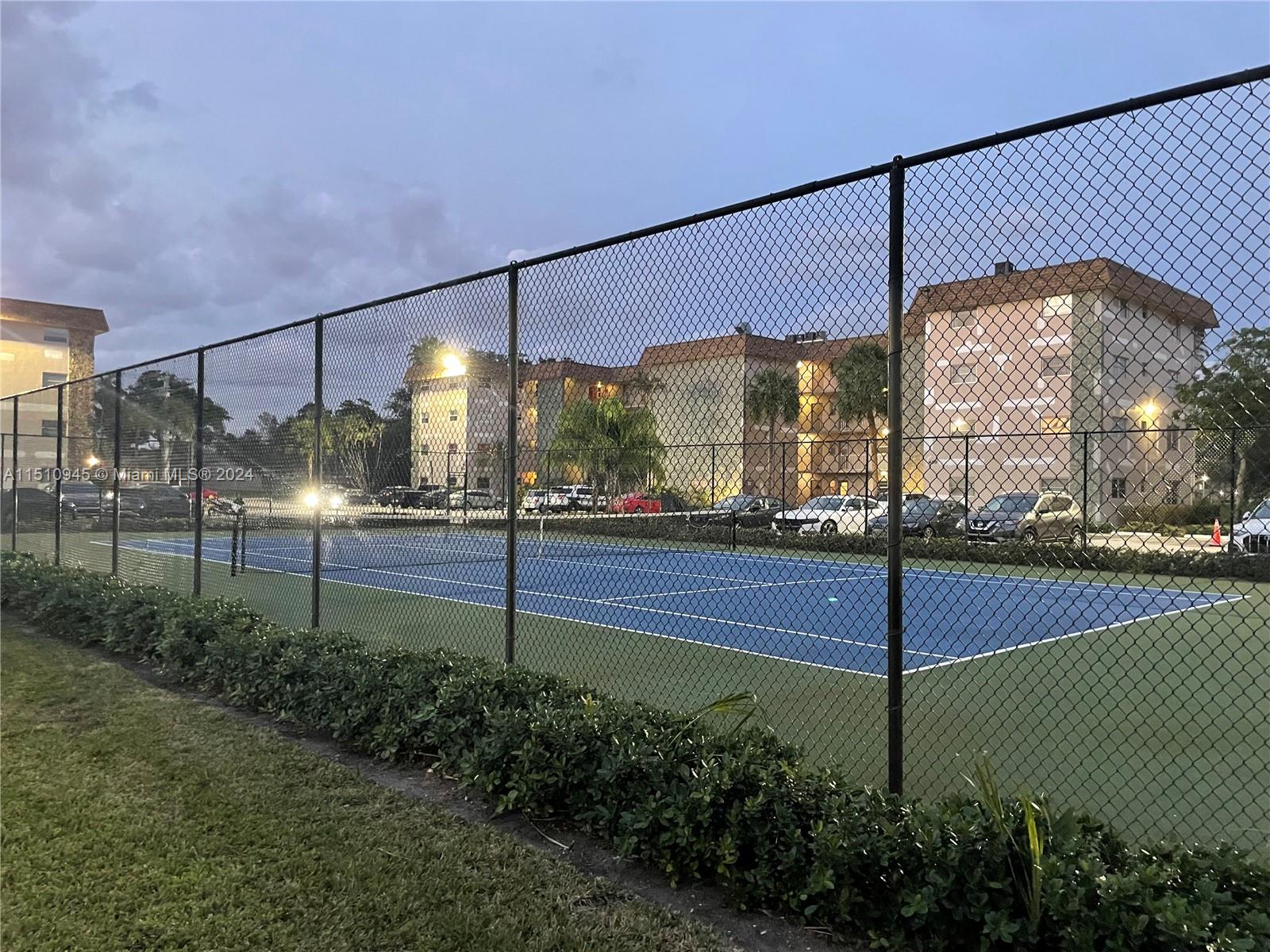 Arrowhead Davie, FL 33324 - Photo 37 of 40 a view of a tennis court