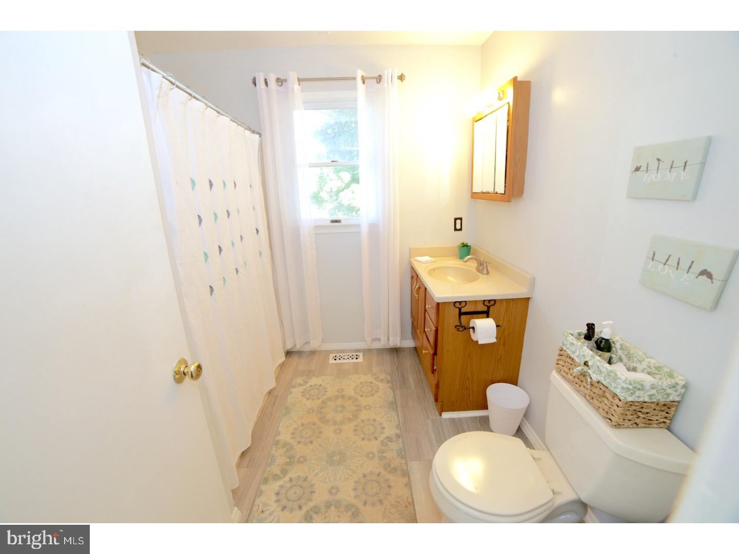 168 Stewart Road Pilesgrove, NJ 08098 - Photo 9 of 17 a bathroom with a sink toilet and shower