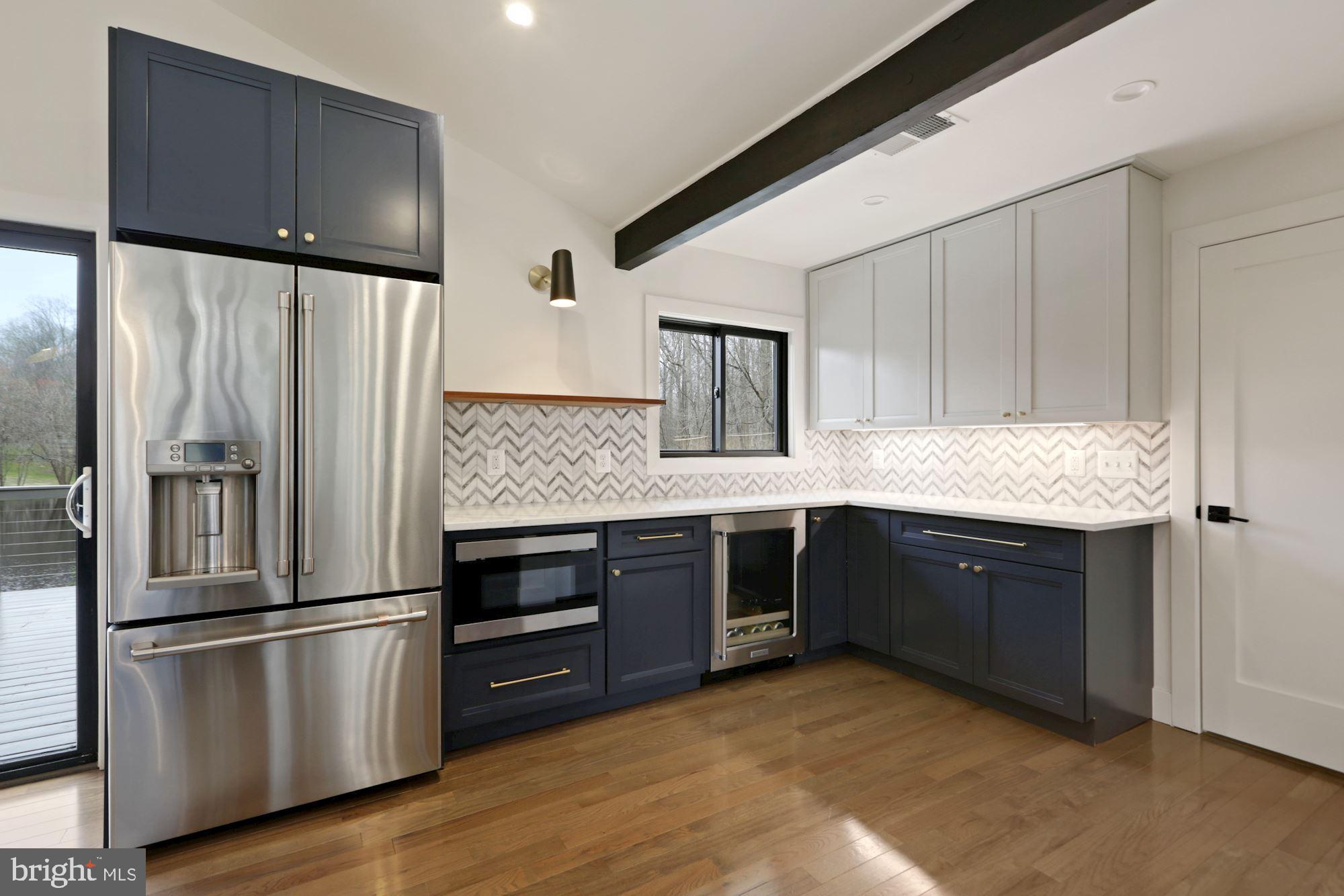 12023 Rusty Road Fairfax Station, VA 22039 - Photo 11 of 60 Stainless steel appliances and wine refrigerator.