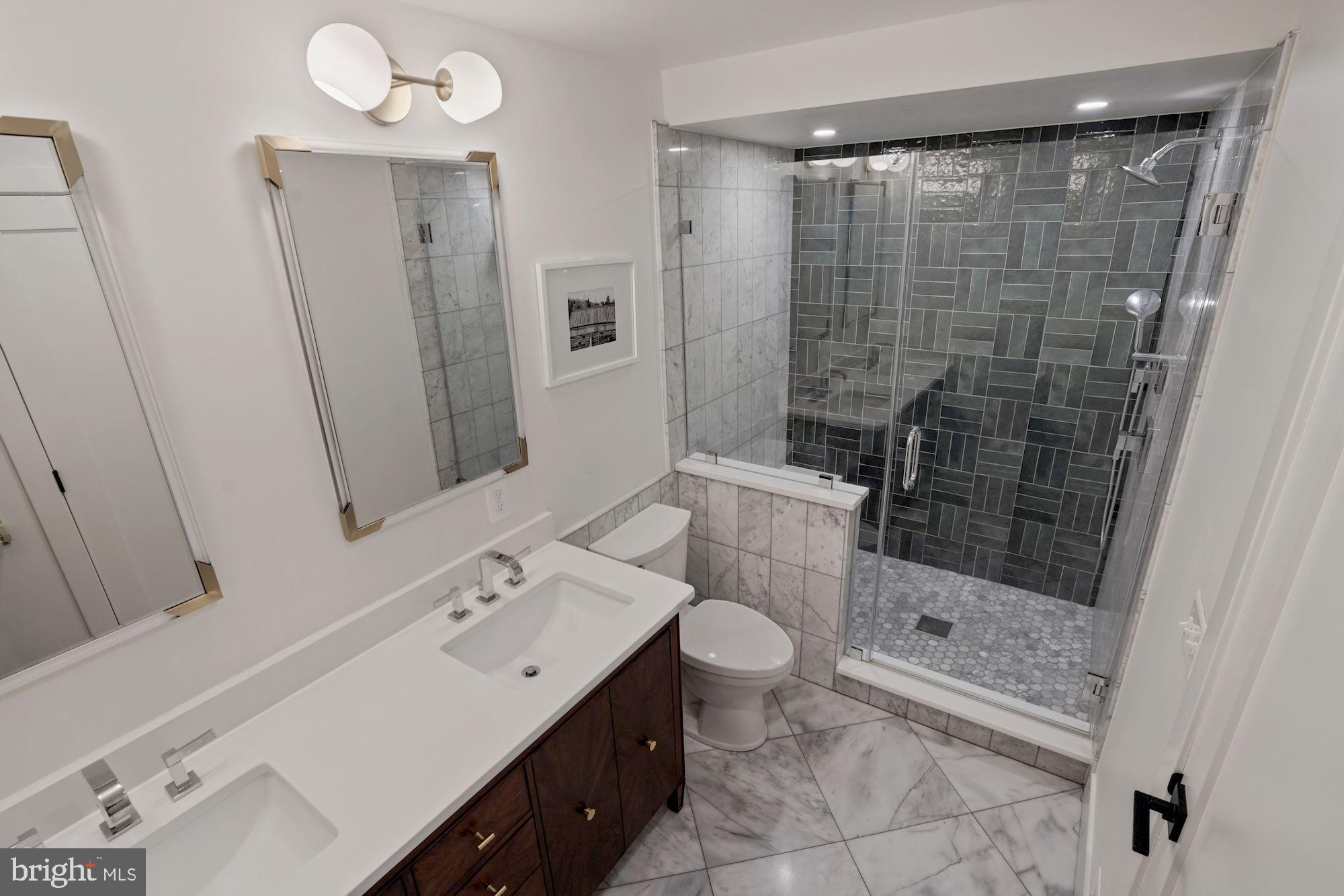 12023 Rusty Road Fairfax Station, VA 22039 - Photo 20 of 60 The custom main floor marble master bathroom.