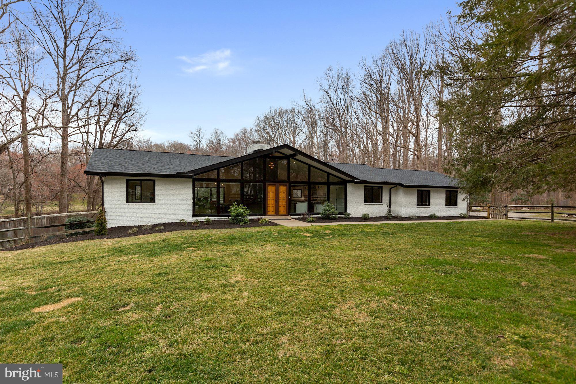 12023 Rusty Road Fairfax Station, VA 22039 - Photo 3 of 60 New roof and freshly painted, four sided brick.