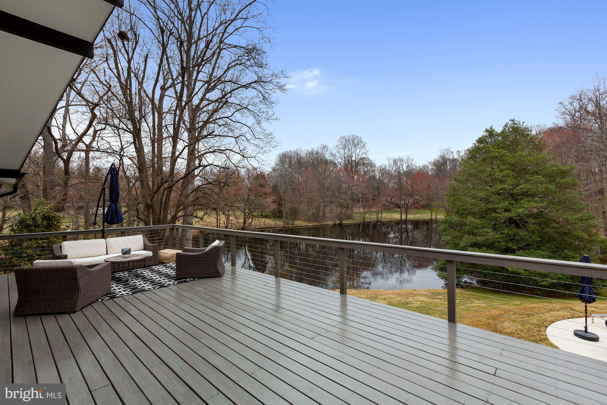 12023 Rusty Road Fairfax Station, VA 22039 - Photo 38 of 60 Large deck with cable railing.