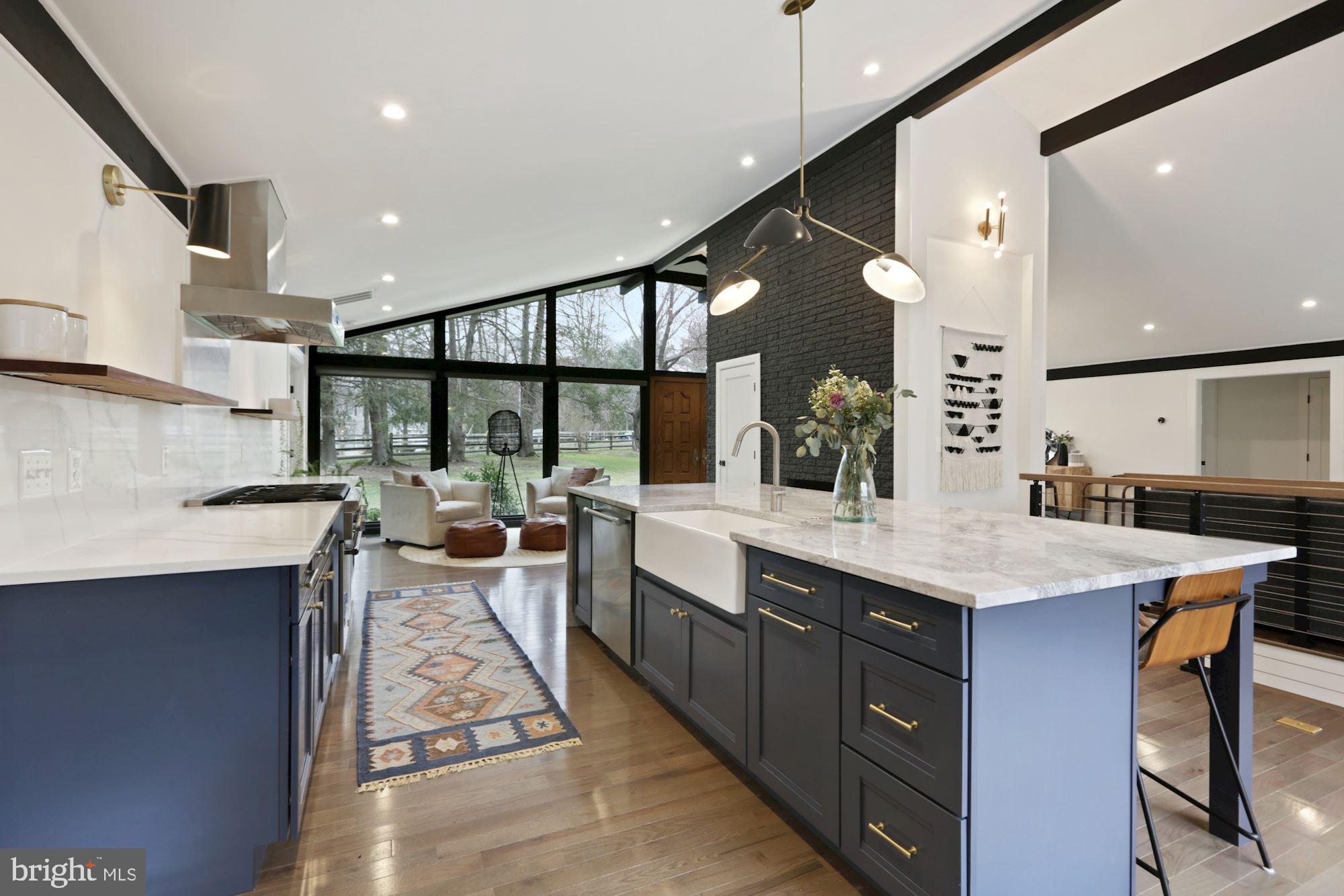 12023 Rusty Road Fairfax Station, VA 22039 - Photo 8 of 60 Quartzite countertops with a porcelain sink.