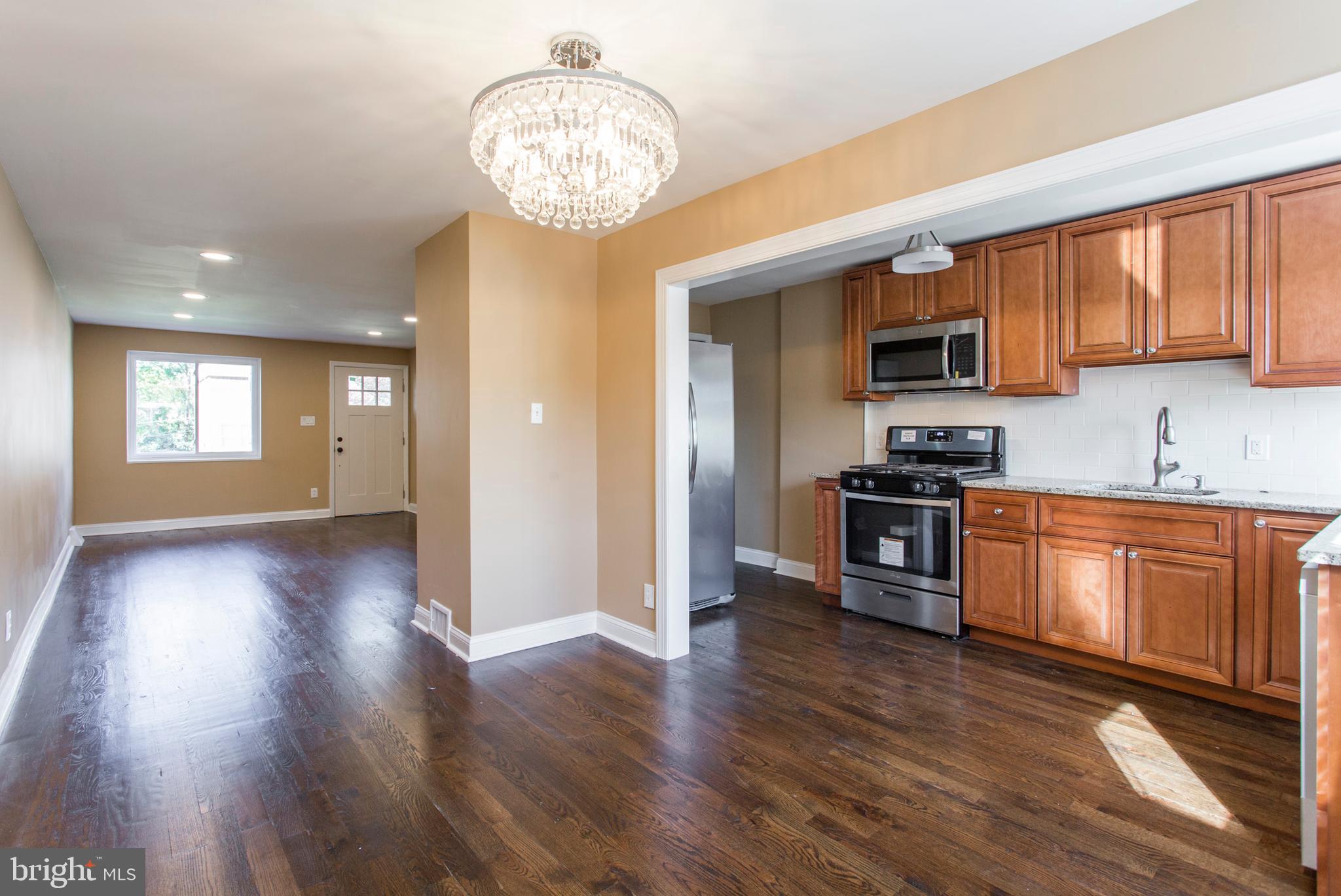 1975 Carter Road Folcroft, PA 19032 - Photo 6 of 25 Open Concept Kitchen, Dining, and Living Room