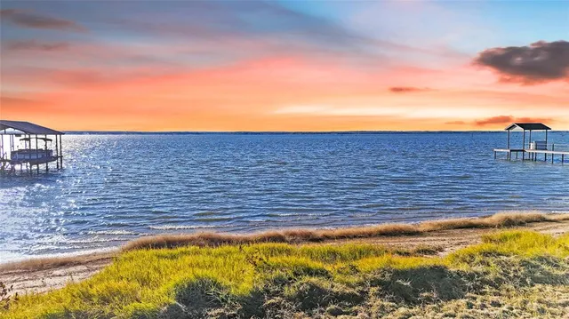 a view of a swimming pool and an outdoor space