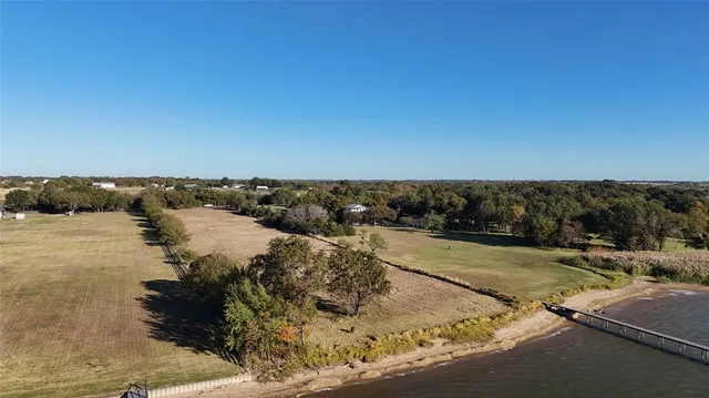 a view of a swimming pool and an outdoor space