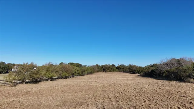 a view of a room with floor to ceiling window