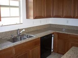 2293 Huntington Point Road, Unit 159 Chula Vista, CA 91914 - Photo 3 of 8 Kitchen w/granite countertops and plenty of cabinets for storage