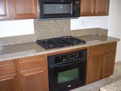 2293 Huntington Point Road, Unit 159 Chula Vista, CA 91914 - Photo 4 of 8 2nd shot of kitchen showing more cabinets and range