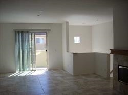 2293 Huntington Point Road, Unit 159 Chula Vista, CA 91914 - Photo 5 of 8 View from Kitchen looking across dining room into living room and out to the balcony