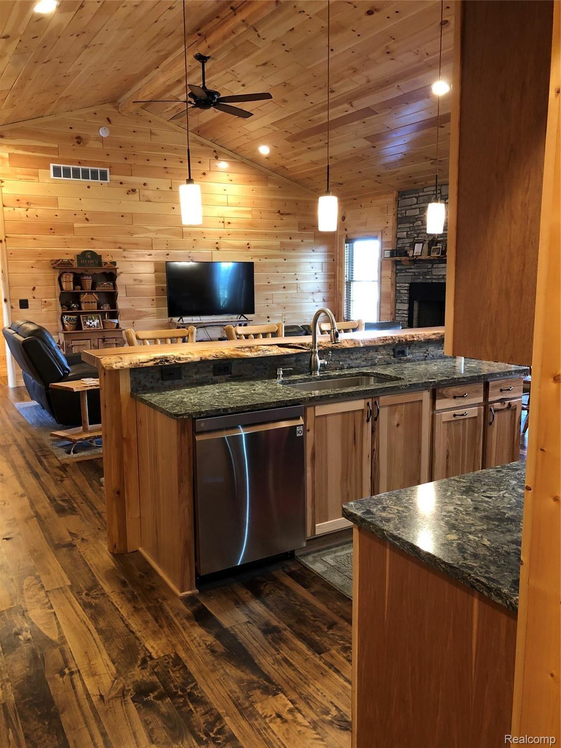 6263 General Squier Road Almont, MI 48003 - Photo 6 of 45 View into kitchen & great room from garage access door