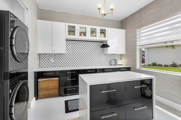 $895,000 | 9009 New Hope Court, Royal Palm Beach, FL 33411
