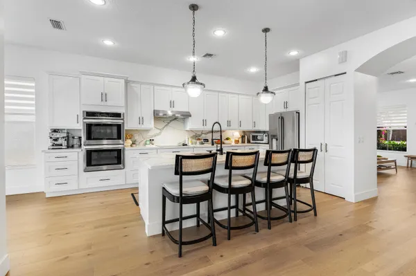 $895,000 | 9009 New Hope Court, Royal Palm Beach, FL 33411