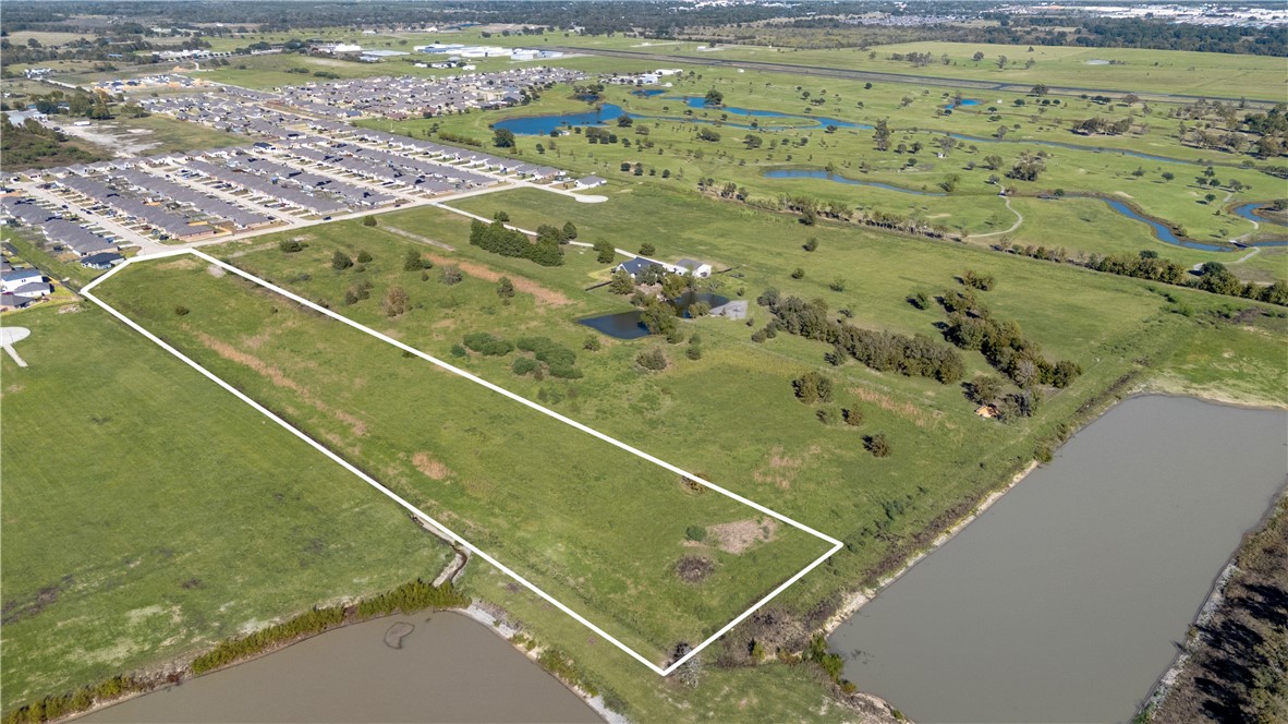 Lot 45 Back Nine Lane Navasota, TX 77868 - Photo 1 of 18 a view of a tennis court