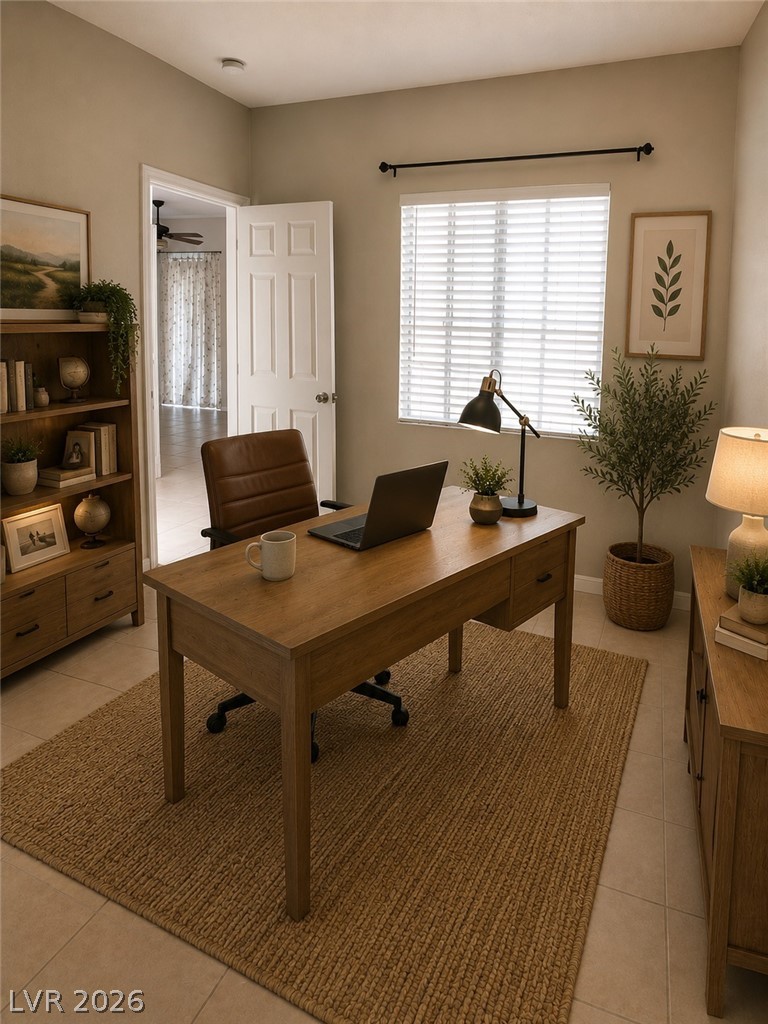 346 Seine Way Henderson, NV 89014 - Photo 10 of 24 A quiet office space features tiled flooring and a door leading to additional interior rooms.