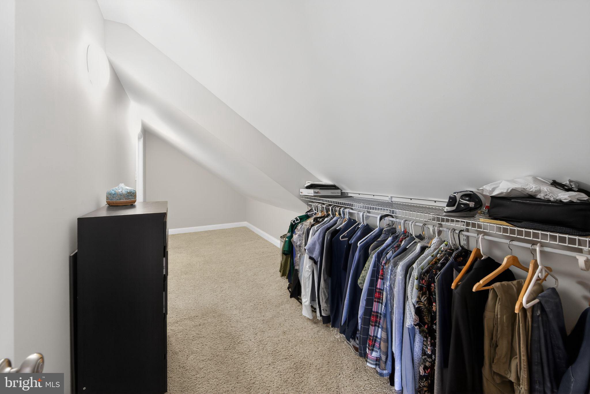 14 North Concord Road West Chester, PA 19380 - Photo 14 of 25 a view of walk in closet with clothes and shoes
