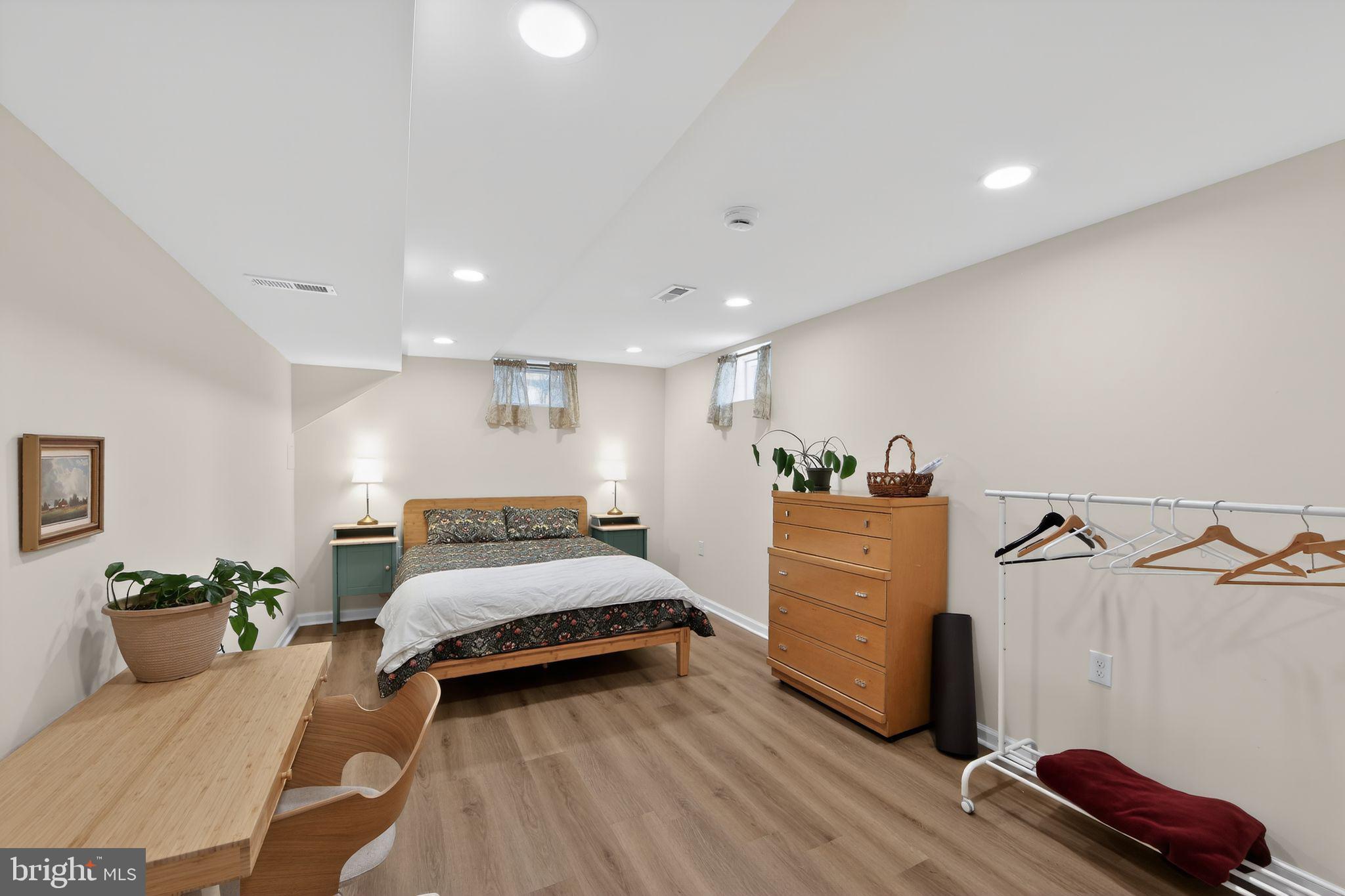 14 North Concord Road West Chester, PA 19380 - Photo 19 of 25 a bedroom with a bed and a dresser