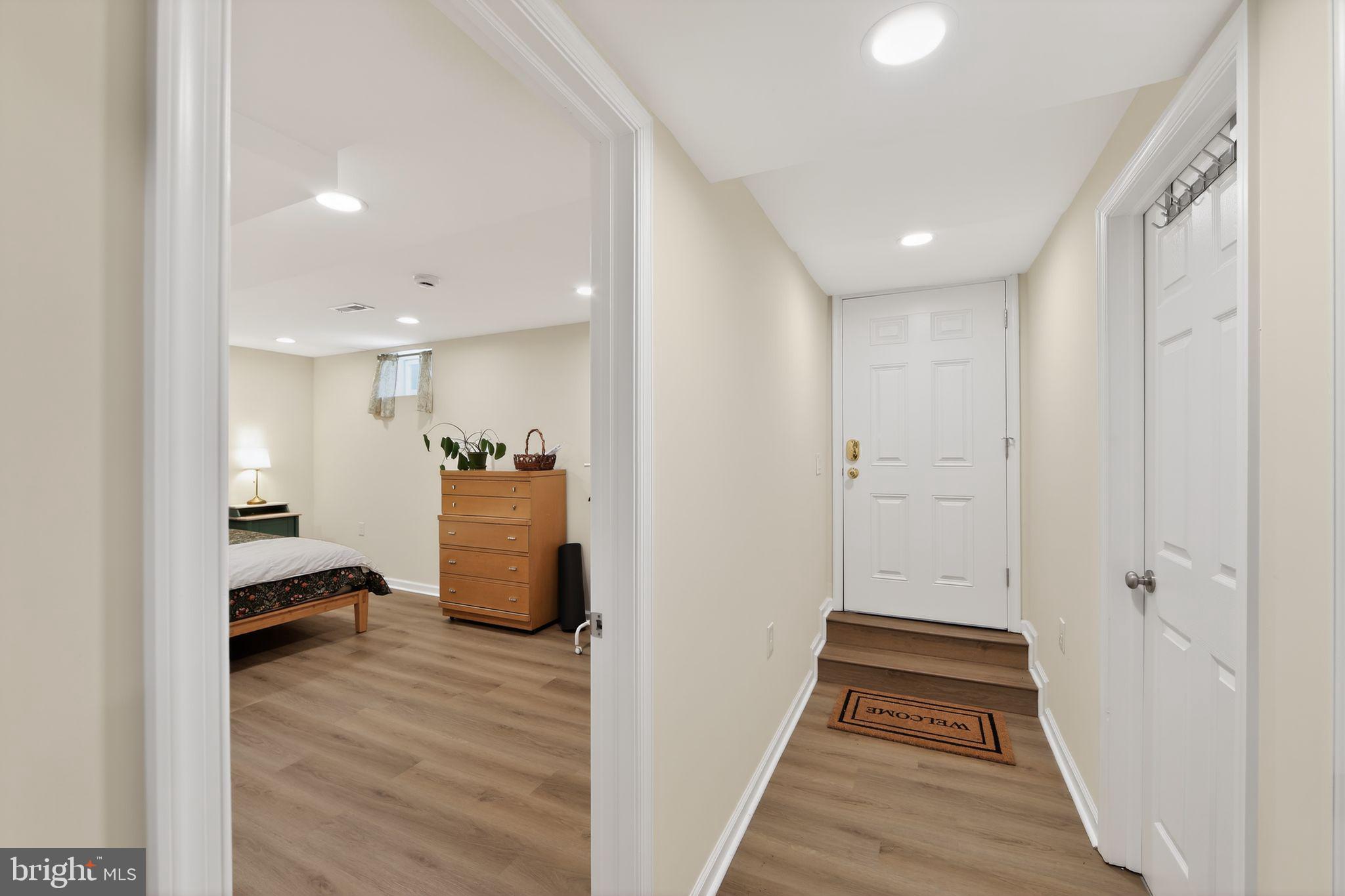 14 North Concord Road West Chester, PA 19380 - Photo 21 of 25 a view of a hallway with wooden floor and furniture