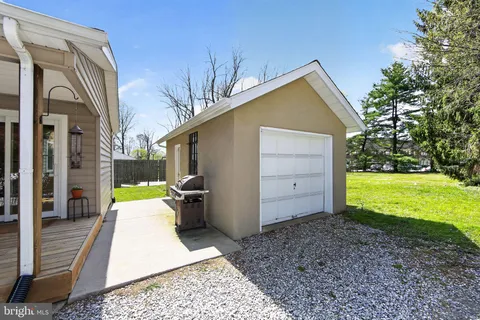 a view of a back yard of the house