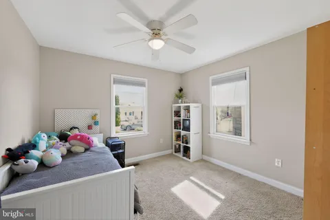 a room with furniture and a window