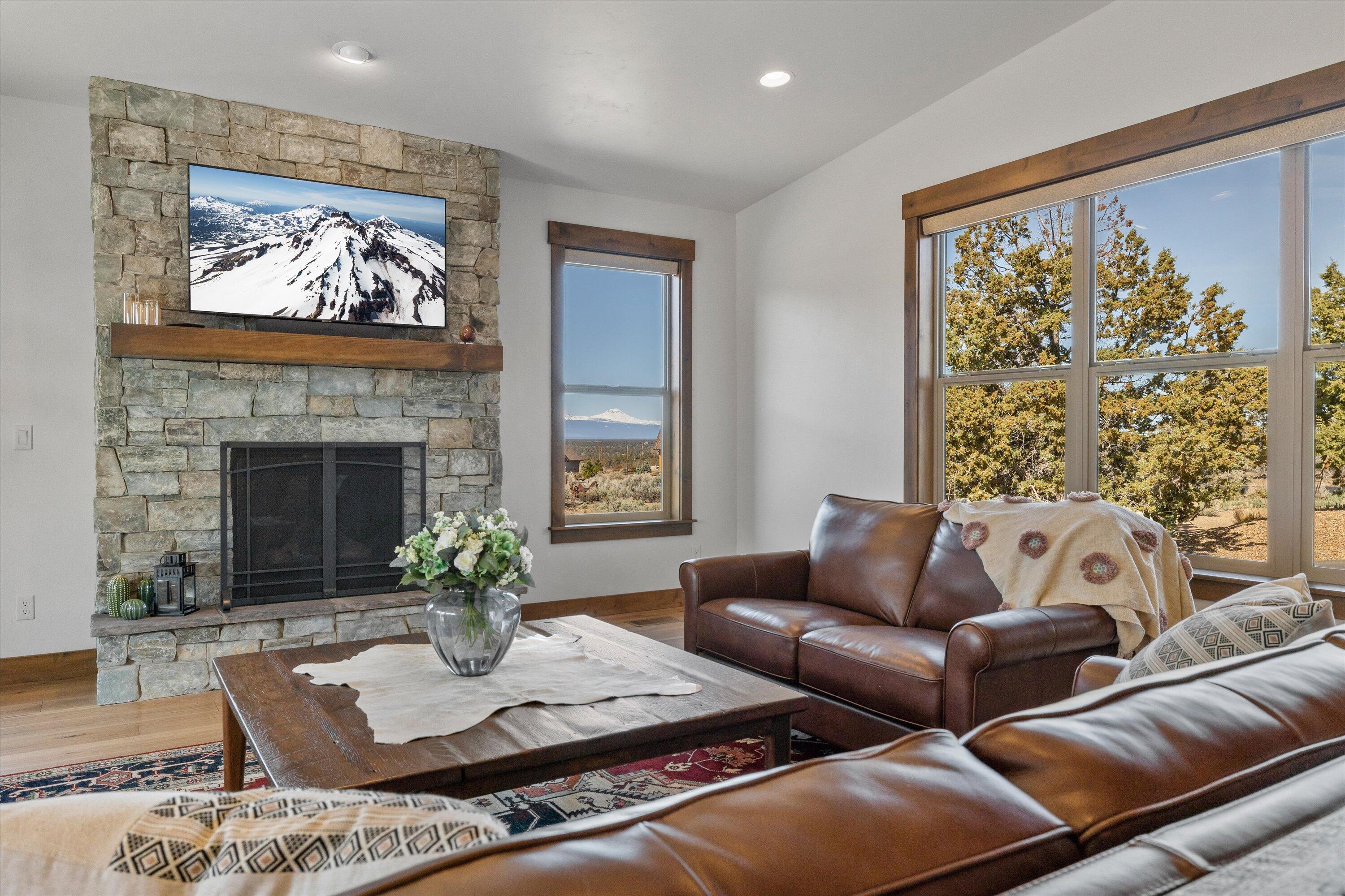 15687 Southwest Brasada Rnch Road Powell Butte, OR 97753 - Photo 12 of 73 a living room with furniture and a large window