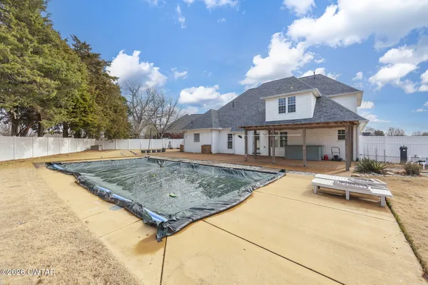 a white bath tub sitting next to a window