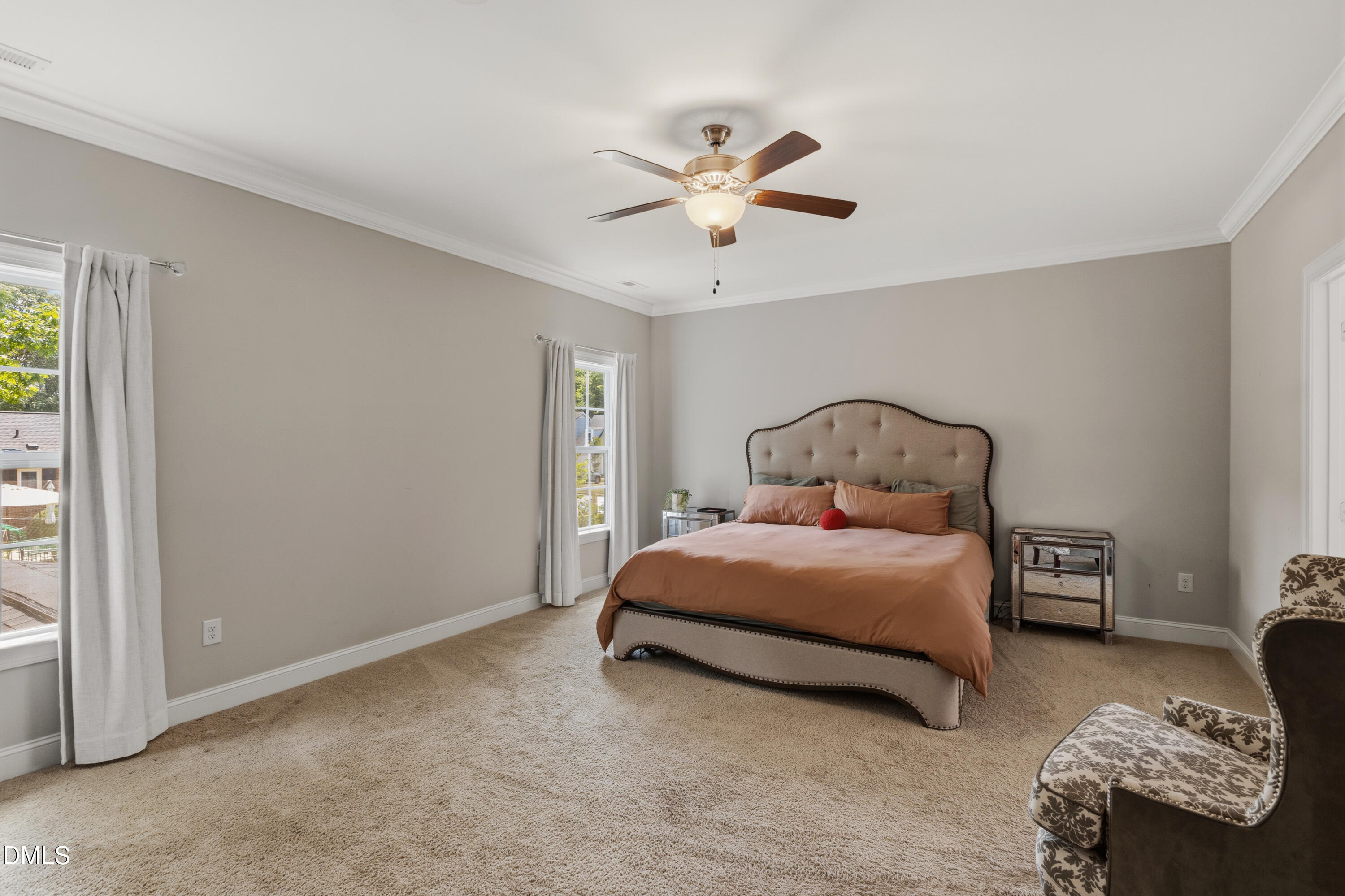 7421 Stonehenge Farm Lane Raleigh, NC 27613 - Photo 10 of 48 a bedroom with a bed dresser and a window