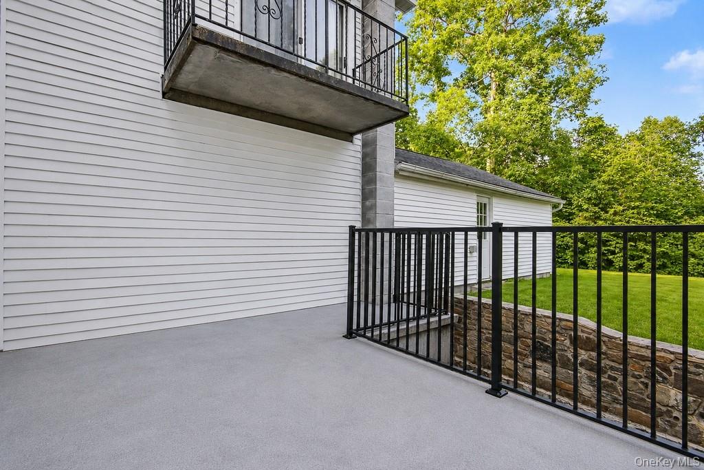 2 Troy Place Patterson, NY 12563 - Photo 26 of 49 Primary bedroom deck/balcony up, patio off kitchen lower