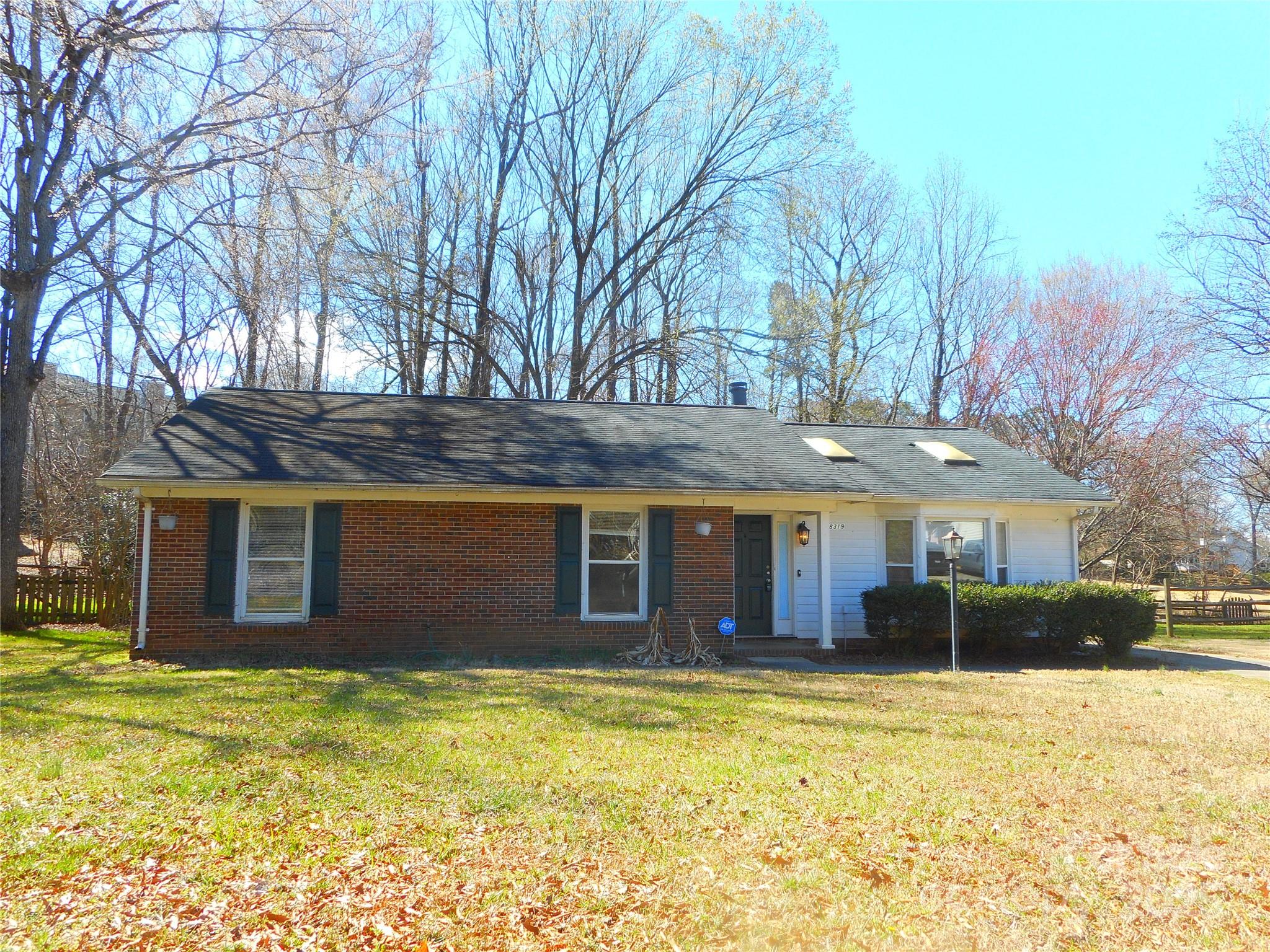 8319 Golf Ridge Drive Charlotte, NC 28277 - Photo 1 of 20 a house view with a seating space and garden