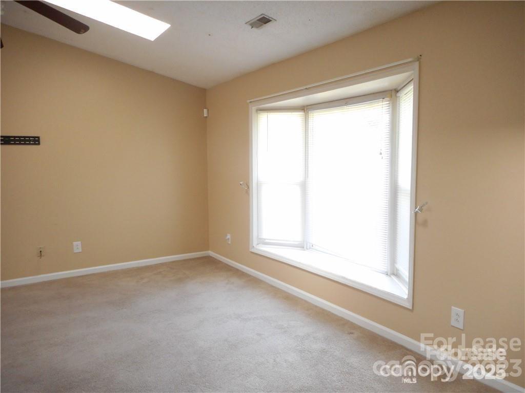 8319 Golf Ridge Drive Charlotte, NC 28277 - Photo 15 of 20 a view of empty room with window