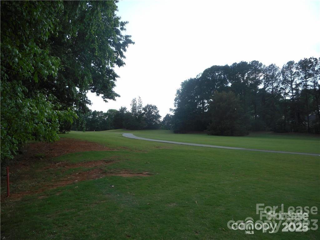 8319 Golf Ridge Drive Charlotte, NC 28277 - Photo 20 of 20 a view of a field of grass and trees