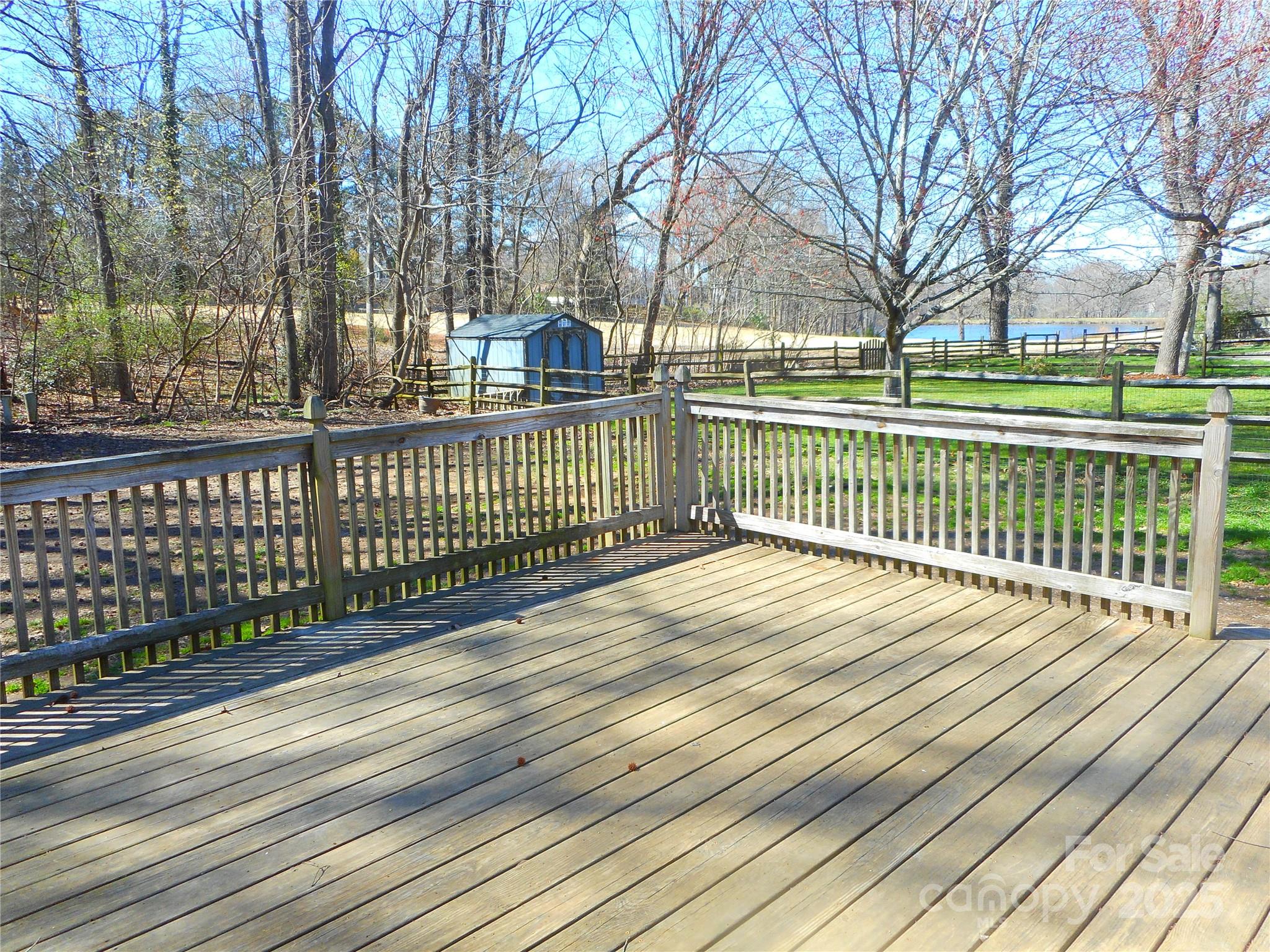 8319 Golf Ridge Drive Charlotte, NC 28277 - Photo 7 of 20 a view of a wooden deck with a yard
