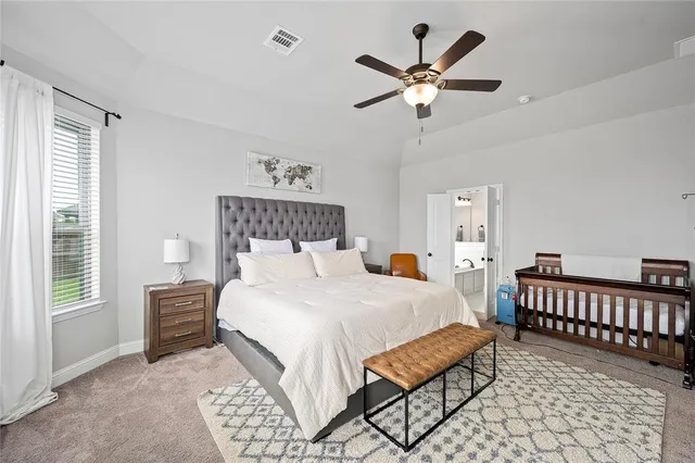 a view of staircase with wooden floor and a potted plant