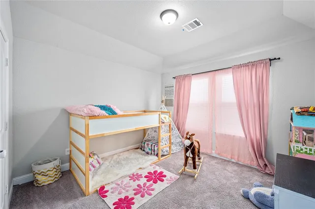 a view of a golf course with furniture