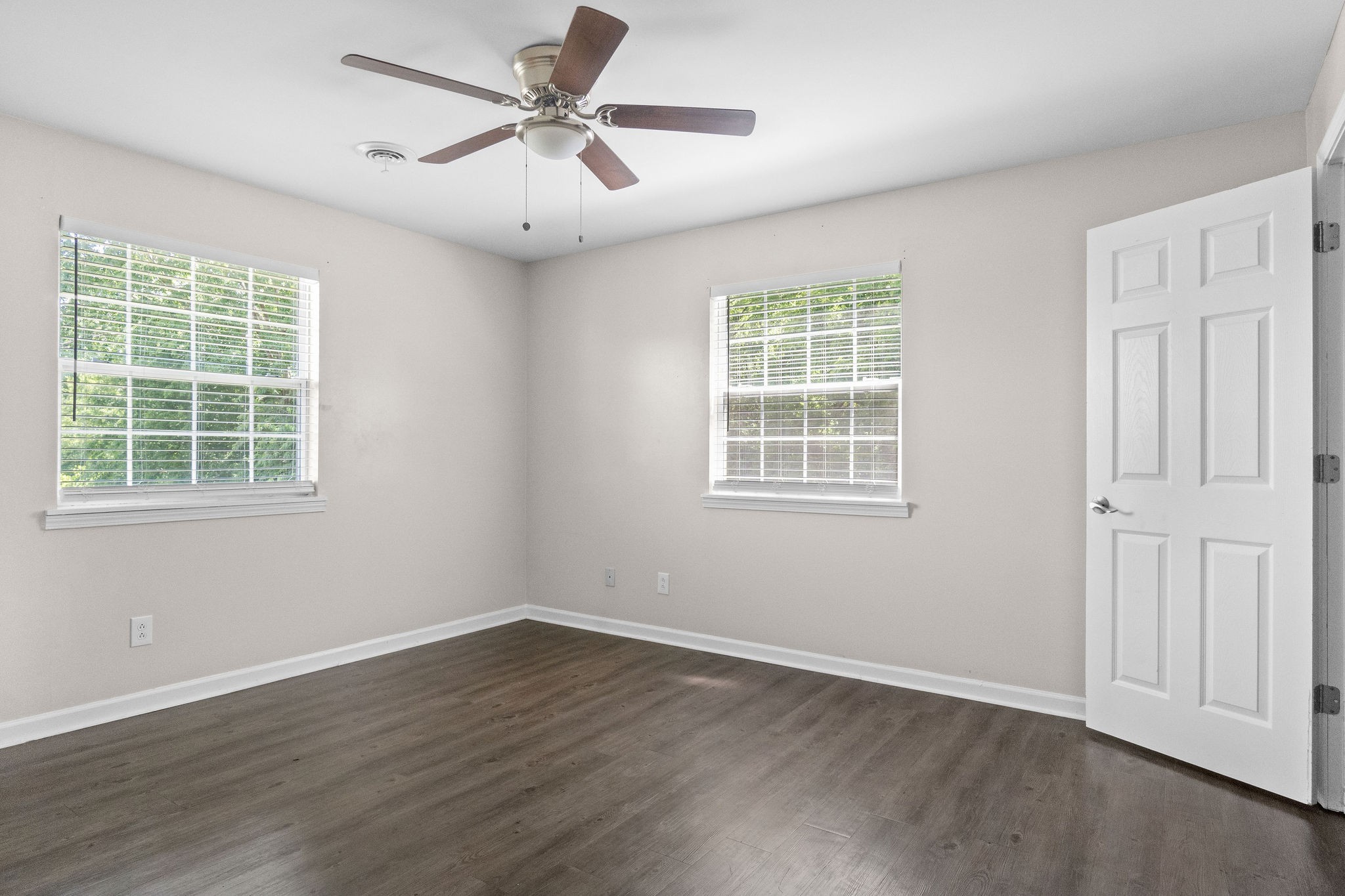 3855 Northeast Drive, Unit H Clarksville, TN 37040 - Photo 14 of 23 a view of an empty room with a window and wooden floor