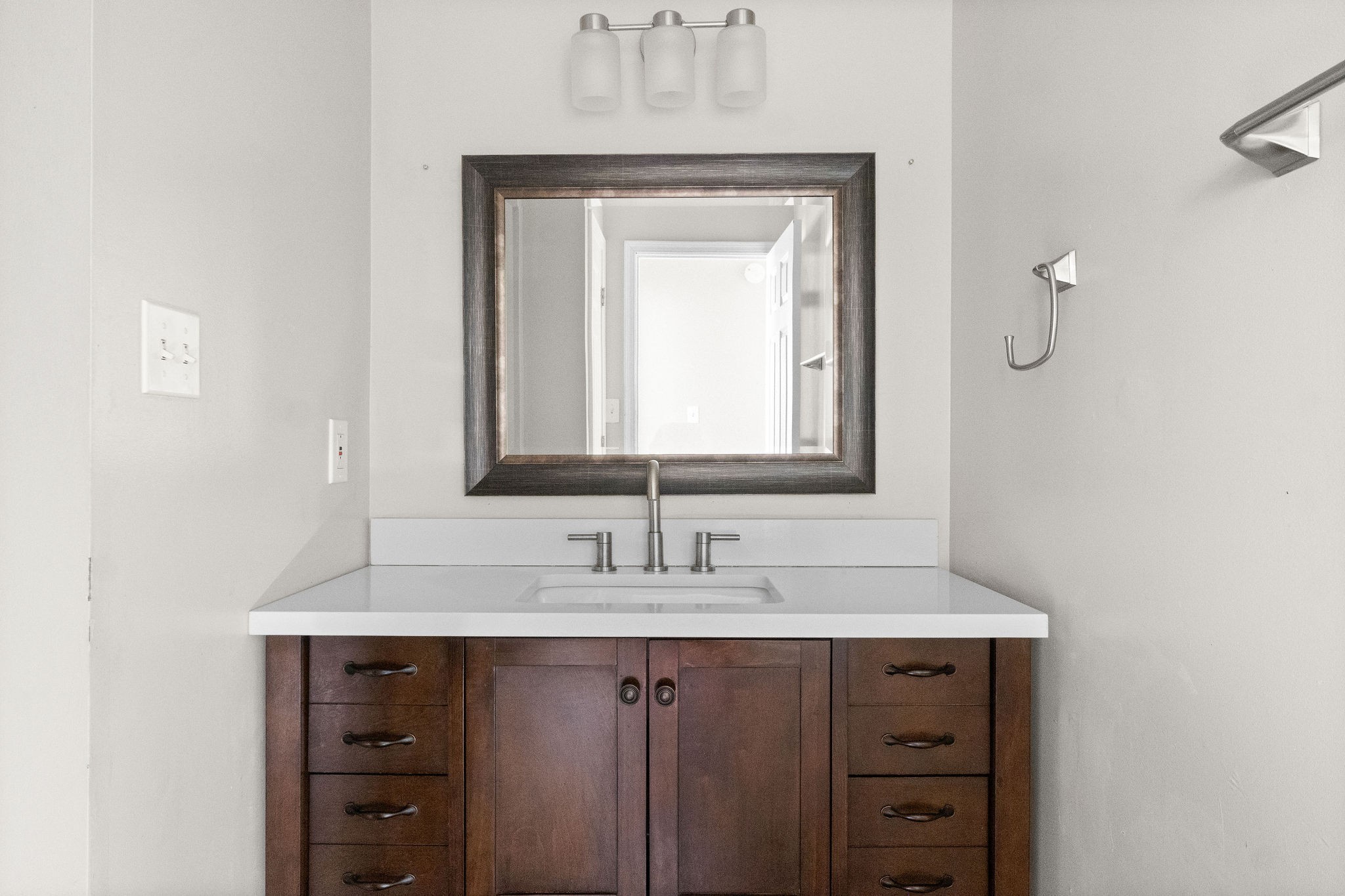 3855 Northeast Drive, Unit H Clarksville, TN 37040 - Photo 19 of 23 a bathroom with a sink vanity and a mirror