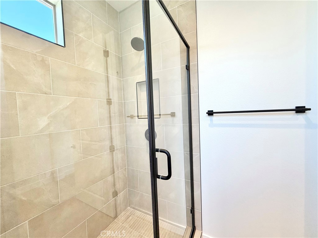 29561 Monarch Road Menifee, CA 92586 - Photo 19 of 35 a bathroom with a shower